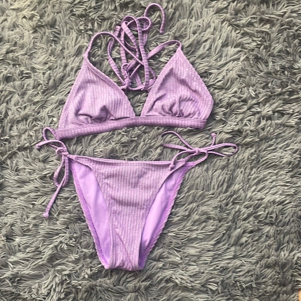 purple sparkly bathing suit from target, pretty covering everywhere,worn twice.
